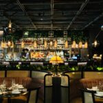 Cozy and elegant restaurant scene with stylish bar and seating area, perfect for dining out.